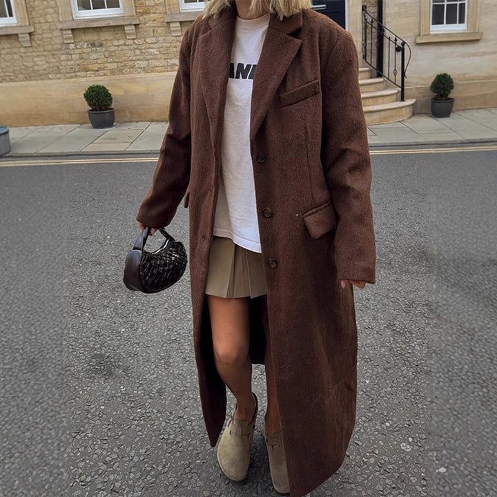 Damen Maxilanger Boxy-Mantel aus Teddy-Fauxfur mit Reverskragen und Eingrifftaschen Echoarchiv