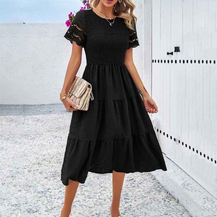 Damen Midikleid mit Puffärmeln und Elastischem Oberteil Echoarchiv