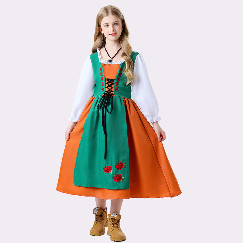 Damen nan folkloristisches Kinderdirndl mit geschnürtem Mieder und bestickter Schürze Echo Archiv