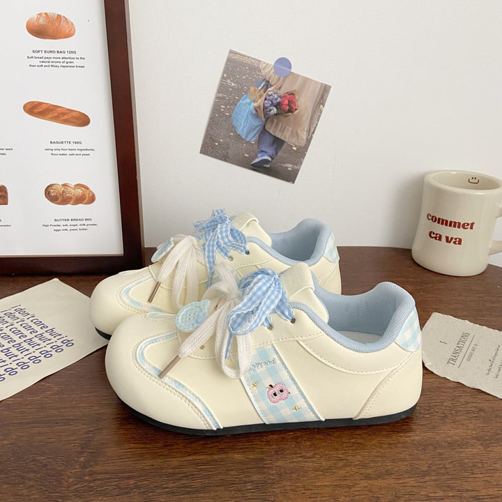 Damen Verspielte Sneakers mit dekorativen Schleifen und tierischen Applikationen Echo Archiv
