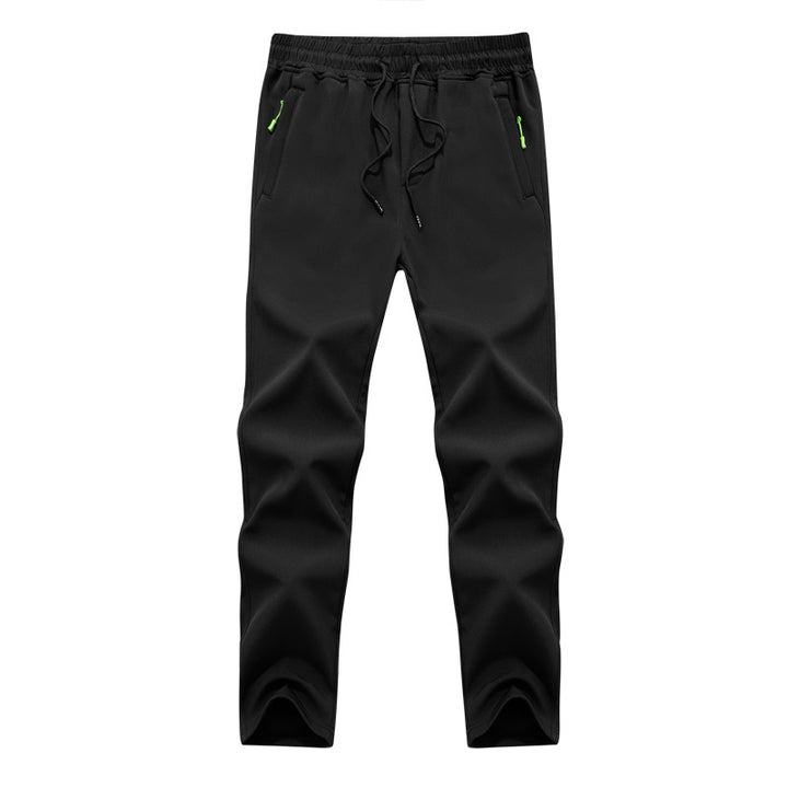Herren Konisch zulaufende Tech-Jogginghose mit elastischem Bund, Reißverschlusstaschen und atmungsaktivem Funktionsmaterial Echoarchiv