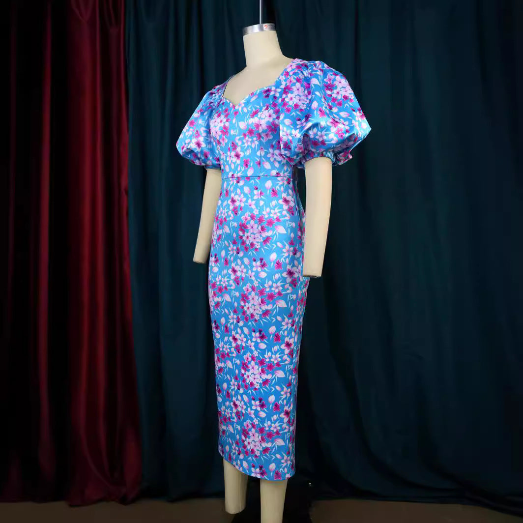 Damen Elegantes Kleid mit voluminösen Puffärmeln und floralem Muster Echo Archiv