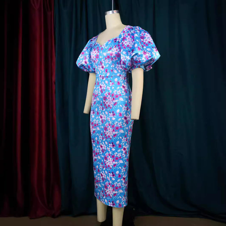Damen Elegantes Kleid mit voluminösen Puffärmeln und floralem Muster Echo Archiv