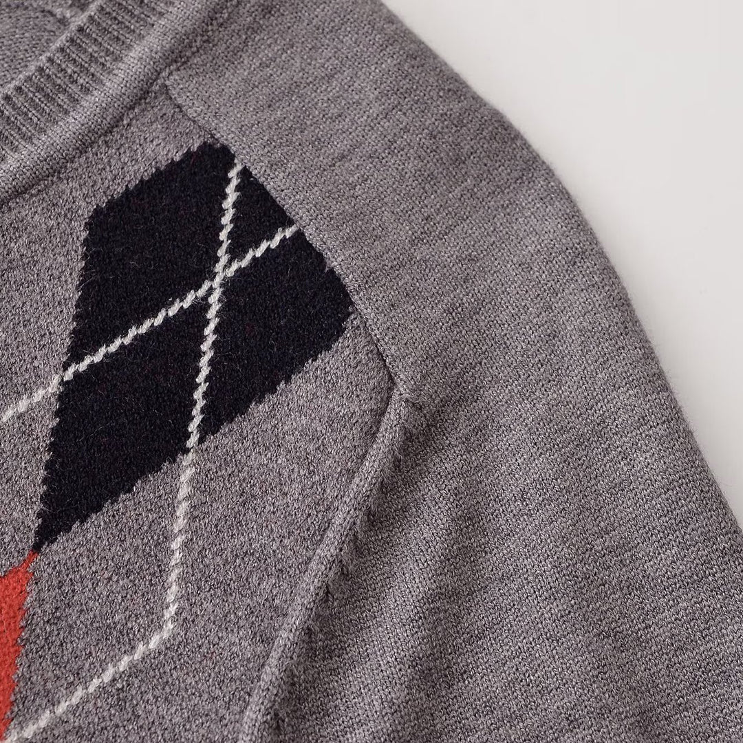 Damen V‑Ausschnitt Pullover mit Rautenmuster und legerer Oversize-Passform Echoarchiv