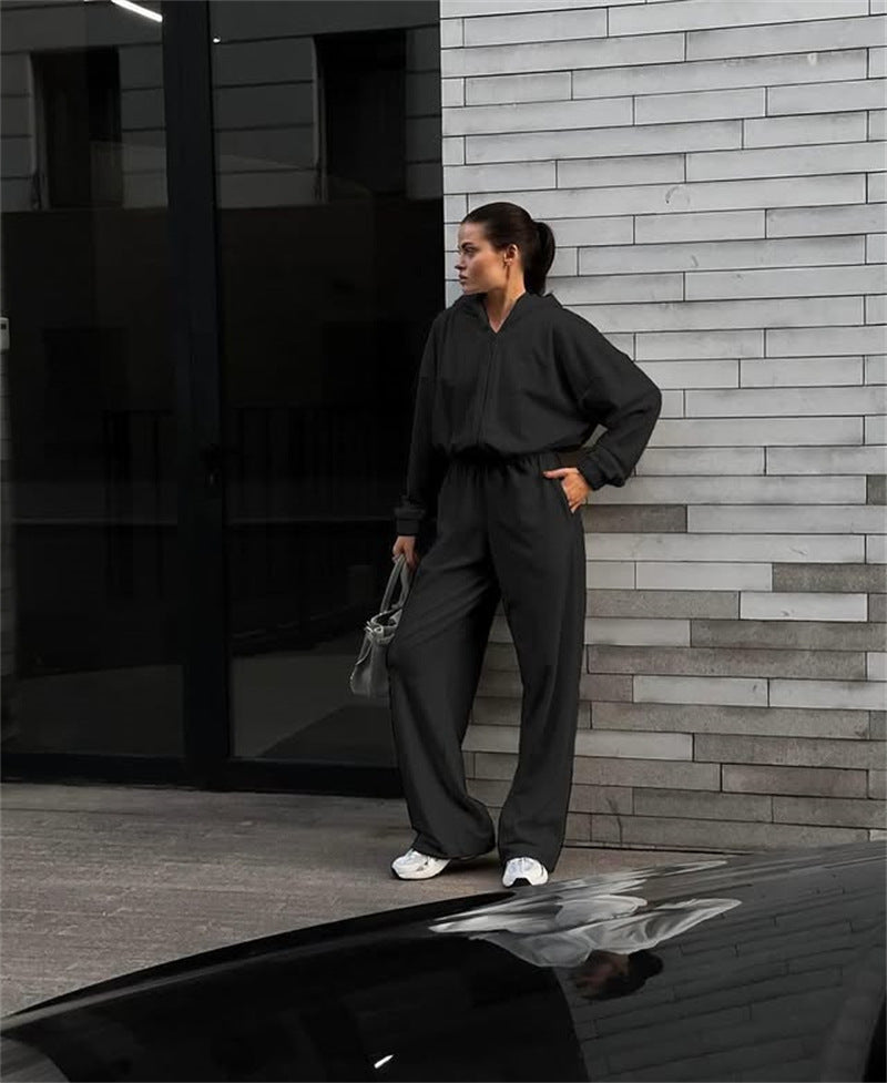 Damen Kapuzen-Jumpsuit mit weitem Bein elastischer Taille und Frontreißverschluss – Solévia