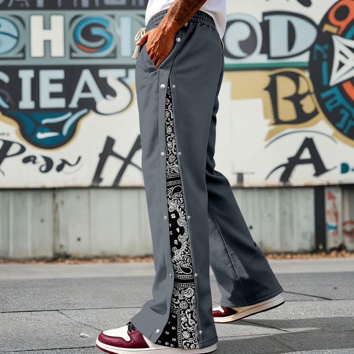 Herren nan weit geschnittene Snap-Front Jogginghose mit Paisley-Seiteneinsatz und elastischem Komfortbund Echo Archiv