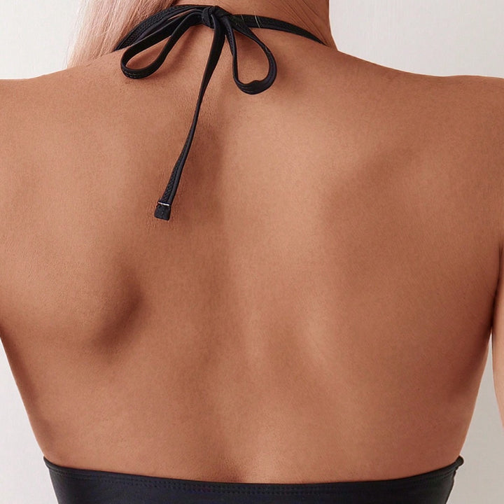 Damen Einteiler mit transparenten Einsätzen und elegantem V-Ausschnitt Echo Archiv
