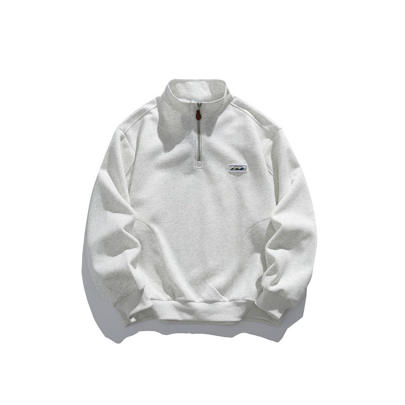 Unisex Halbzip-Sweatshirt mit Stehkragen, Raglanärmeln und minimalistischer Brustpatch Echoarchiv