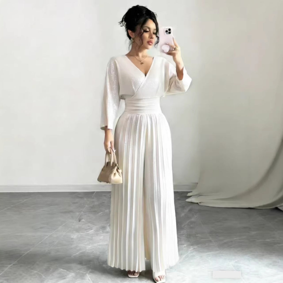 Damen Maxikleid mit Wickeloberteil, Tailliertem Rippbund und Plisseerock – Orélia