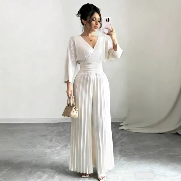 Damen Maxikleid mit Wickeloberteil, Tailliertem Rippbund und Plisseerock – Orélia