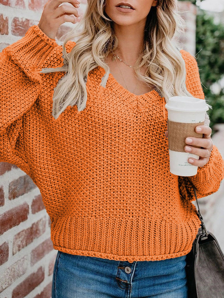 Damen Oversize Grobstrickpullover mit V-Ausschnitt und Rippsaum Echoarchiv