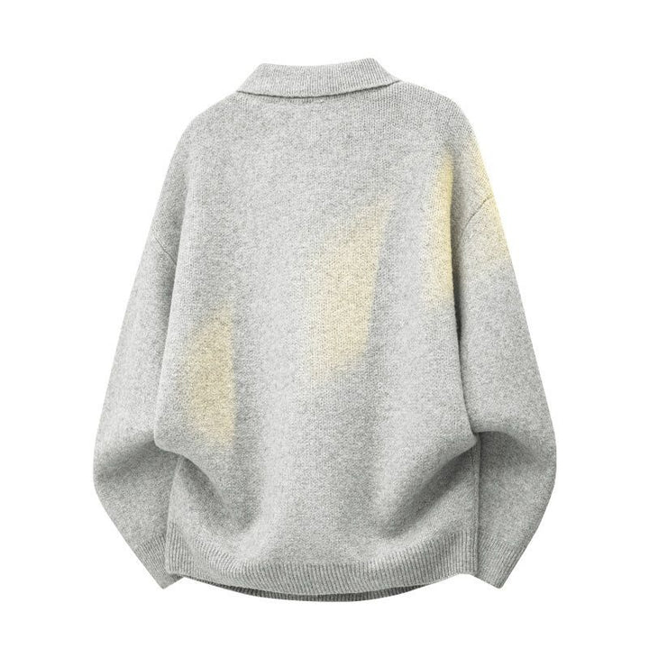 Damen Oversize Polokragen-Strickpullover mit Knopfleiste und geripptem Saum Echoarchiv