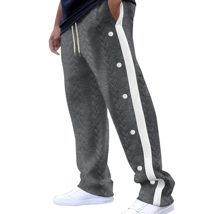 Herren atmungsaktive Jogginghose mit seitlichen Druckknöpfen und einzigartigem Strickdesign Echoarchiv