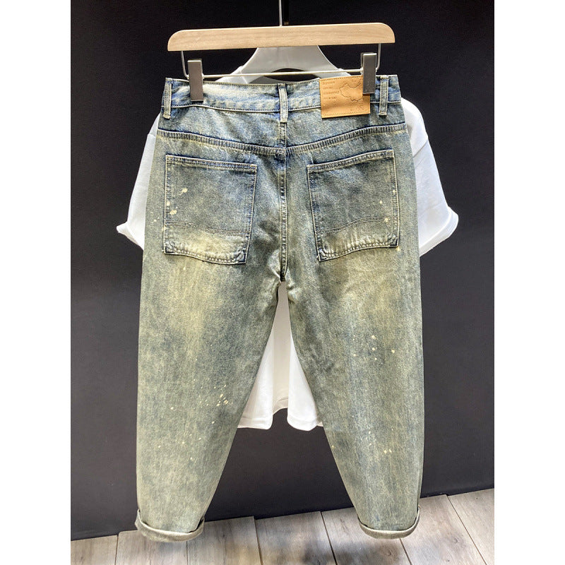 Herren Relaxed-Tapered Vintage-Jeans mit Paint‑Splatter, hohem Bund und umgeschlagenem Saum Echoarchiv