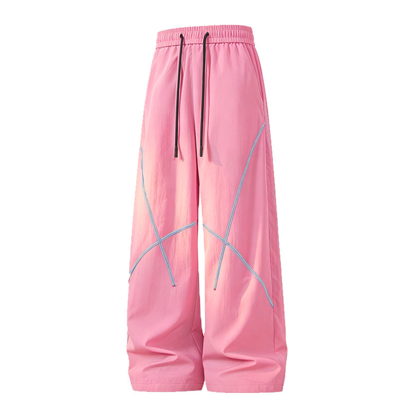 Herren Weite Funktions-Nylonhose mit Kordelbund, reflektierenden Nahtdetails & lässiger Baggy‑Silhouette Echoarchiv