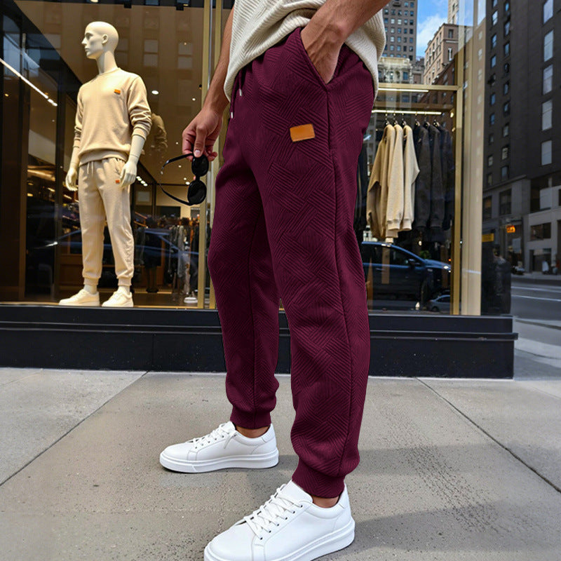 Herren Stepp-Jogginghose mit geometrischem Strukturmuster Echoarchiv