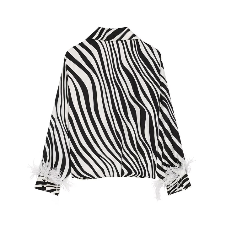 Damen Seidige Oversize-Bluse mit Zebra-Streifen und Federbesatz Echo Archiv
