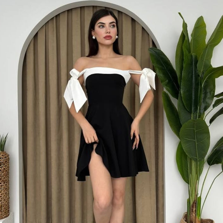 Damen modisches Sommerkleid mit Schleifen-Trägern und schmeichelndem Schnitt Echo Archiv