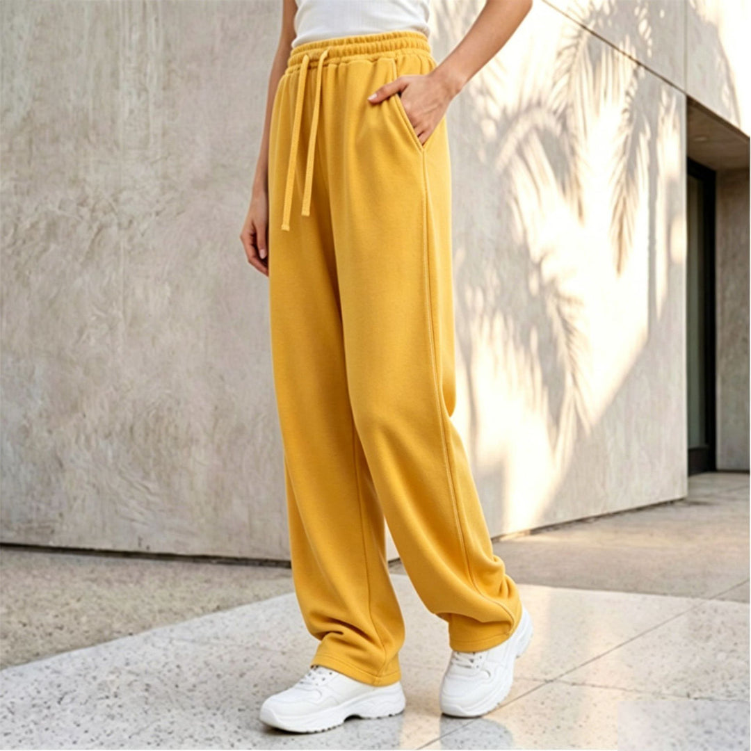 Damen nan weite Loungepalazzo-Hose mit hohem Komfortbund, Kordelzug, seitlichen Eingrifftaschen und dekorativer Seitennaht Echo Archiv