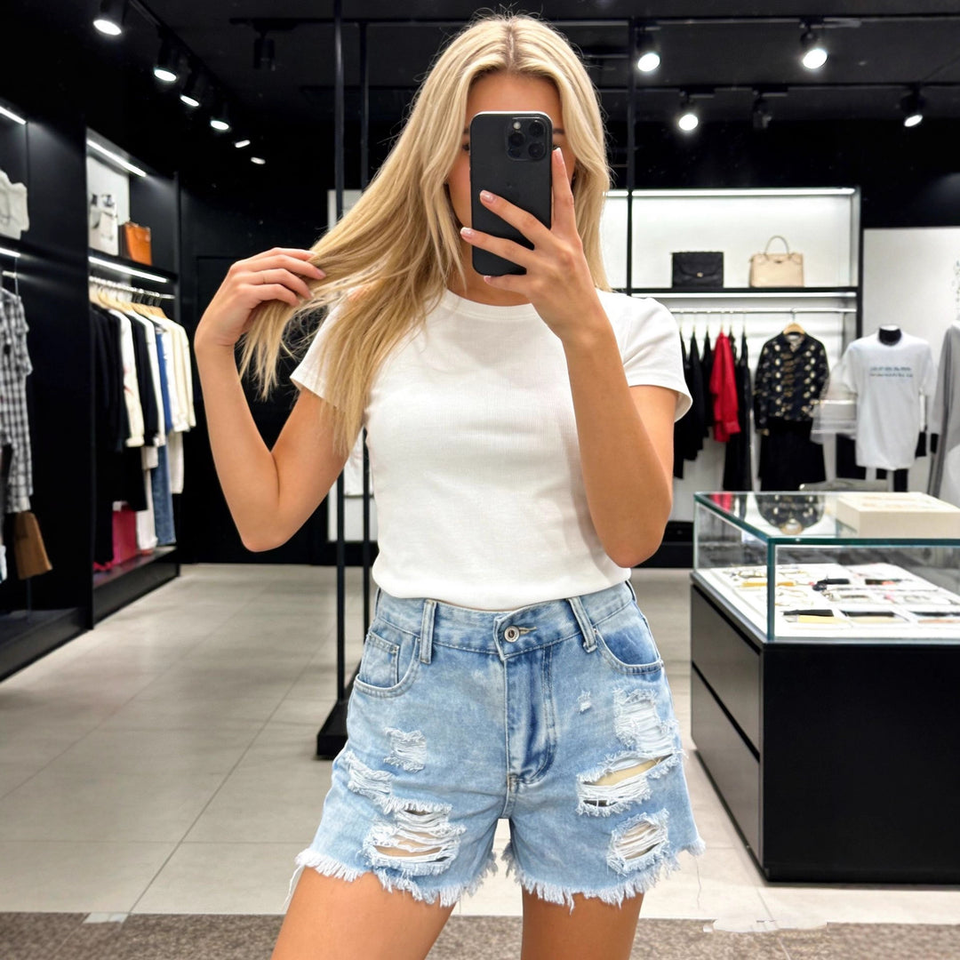Damen Destroyed Denim-Shorts mit hohen Taschen und fransigem Saum Echo Archiv