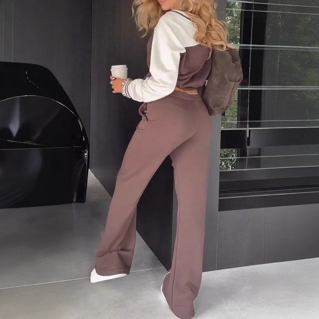 Damen nan sportlich-elegantes Zweiteiler-Set aus Baumwollmix mit V-Ausschnitt Sweatpullover und hochgeschnittener Schlaghose Echo Archiv