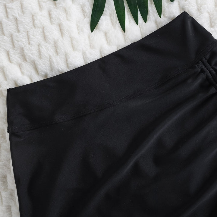 Damen Bade-Rock mit Raffungsdetails und eleganter Wellenkante Echo Archiv
