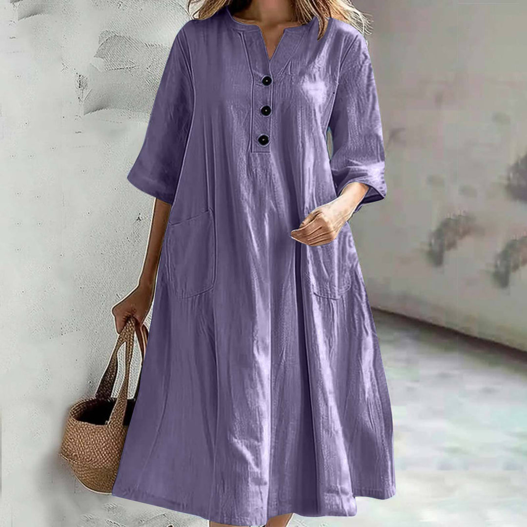 Damen nan locker fallendes A-Linien Kleid mit V-Ausschnitt-Knopfleiste, 3/4-Ärmeln und aufgesetzten Eingrifftaschen Echo Archiv