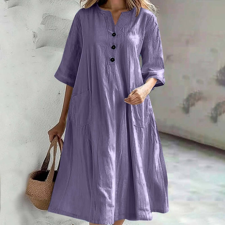 Damen nan locker fallendes A-Linien Kleid mit V-Ausschnitt-Knopfleiste, 3/4-Ärmeln und aufgesetzten Eingrifftaschen Echo Archiv