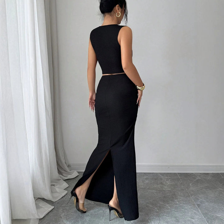 Damen nan zweiteiliges tailliertes Set mit asymmetrischem Cut-Out Crop-Top und figurbetontem Maxi-Bleistiftrock Echo Archiv