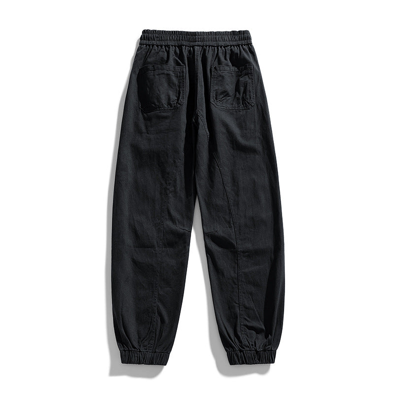Herren Oversized Utility-Jogginghose aus robustem Baumwollmix mit Kordelbund, seitlichen Cargo‑Taschen & gerippten Bündchen Echoarchiv