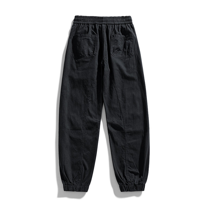 Herren Oversized Utility-Jogginghose aus robustem Baumwollmix mit Kordelbund, seitlichen Cargo‑Taschen & gerippten Bündchen Echoarchiv