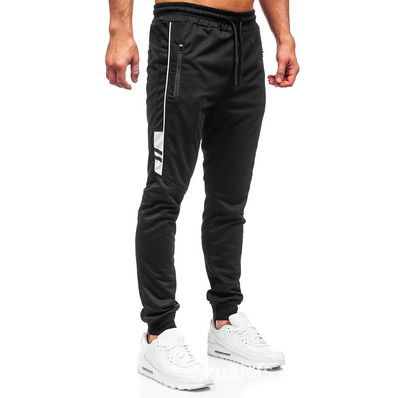 Herren Sportliche Jogginghose mit seitlichen Reißverschlüssen und elastischem Bund Echoarchiv