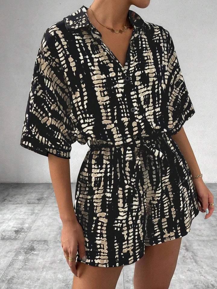 Damen Kurzärmliger Jumpsuit mit floralem Print und Taillengürtel Echo Archiv