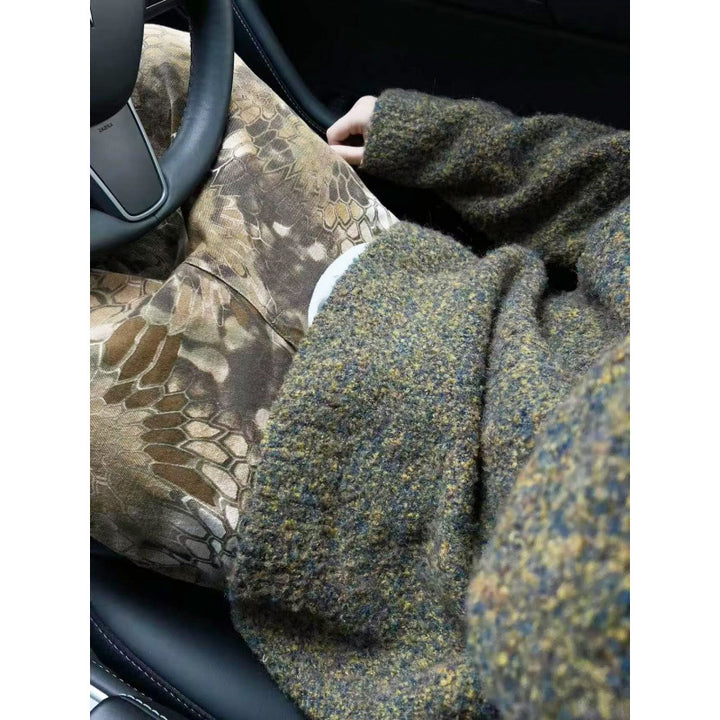 Herren Melangé Grobstrick-Pullover mit V-Schlitz und lockerem Oversize-Schnitt Echoarchiv