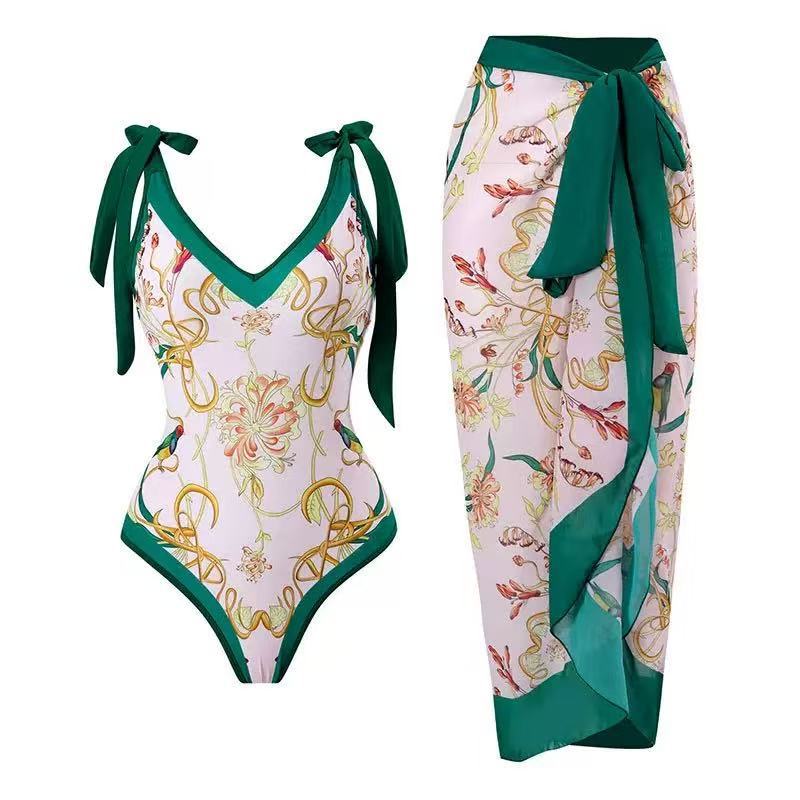 Damen Badeanzug mit floralem Design und transparentem Wickelrock Echo Archiv