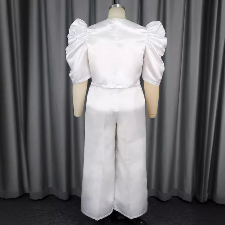 Damen Elegantes Jumpsuit mit voluminösen Puffärmeln und schickem Taillierungsdetail Echo Archiv