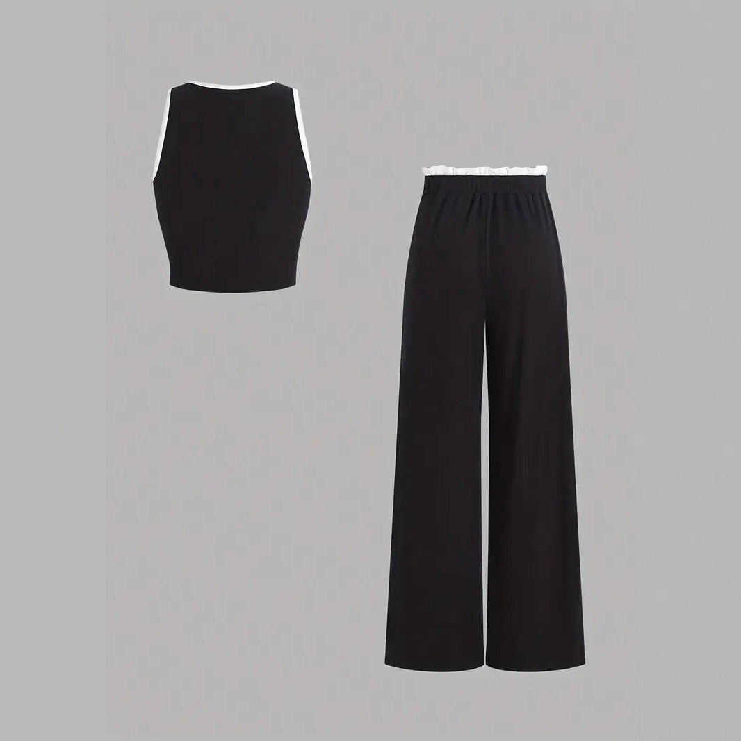 Damen stylishes Sport-Set mit hoch taillierter Weitbein-Hose und sportlichem Bustier Echo Archiv