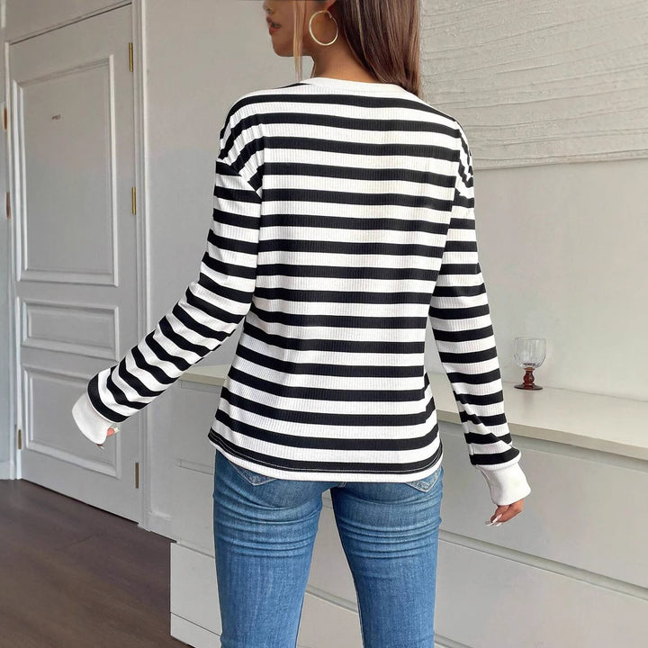 Damen nan gestreiftes Ripp-Langarmshirt mit dreidimensionaler Blumenapplikation und Rundhals Echo Archiv