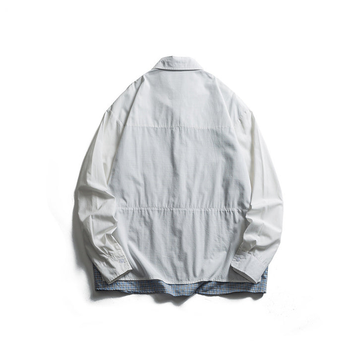 Unisex Oversize Hemdjacke im Lagenlook mit aufgesetzten Brusttaschen und karierter Einsatzkante Echoarchiv