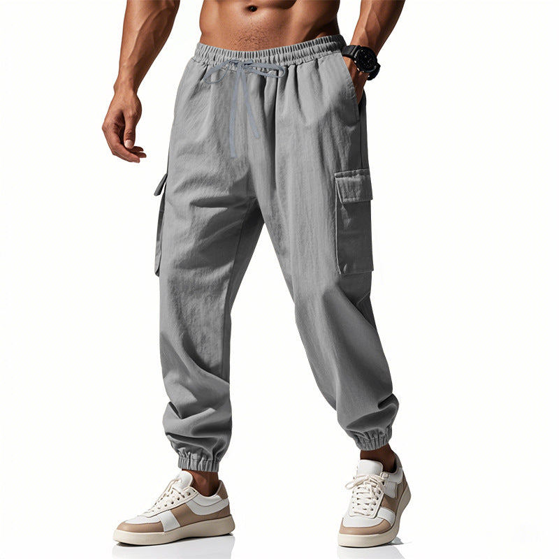 Herren nan konisch zulaufende Jogger im utilitarischen Stil mit elastischem Bund, Kordelzug und Klappentaschen Echo Archiv