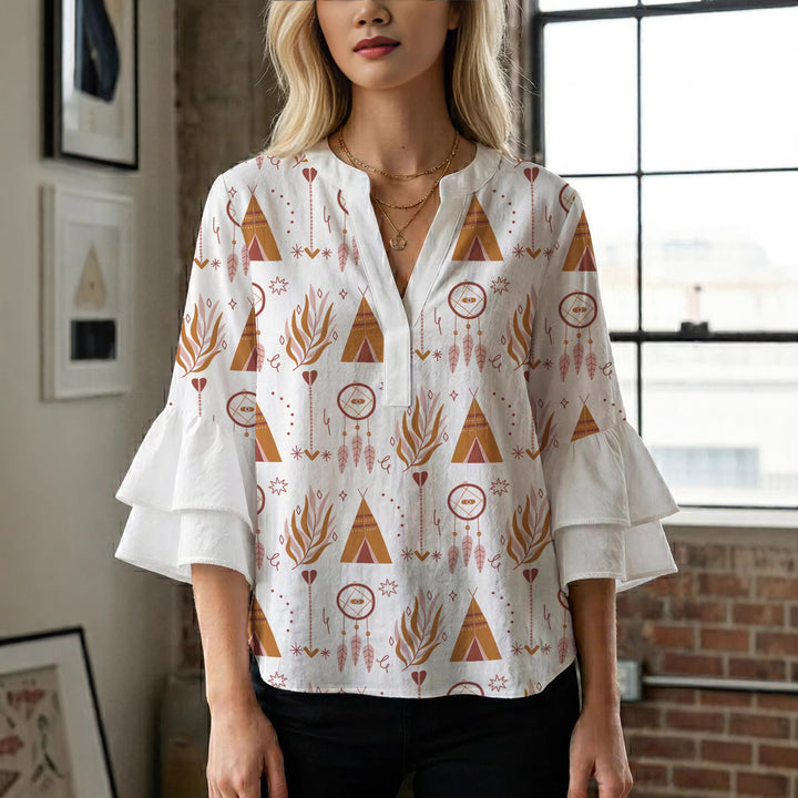 Damen Bluse mit voluminösen Rüschenärmeln und modernem Motiv Echo Archiv