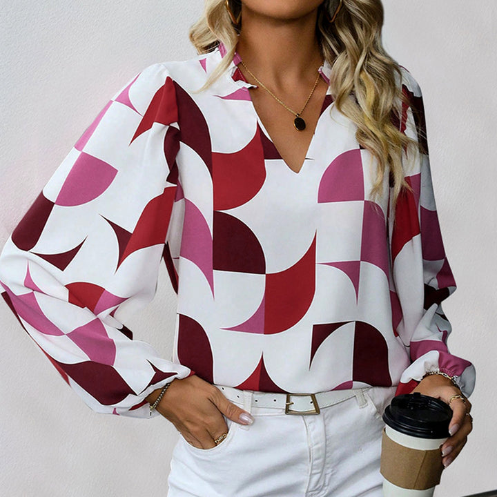 Damen Gemusterte V‑Neck Bluse mit Ballonärmeln und lockerem Fall Echoarchiv