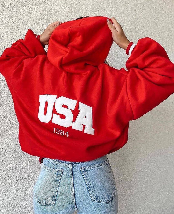 Damen Kurz geschnittener Oversize-Kapuzenpullover mit aufgenähter College-Applikation und gerippten Bündchen Echoarchiv