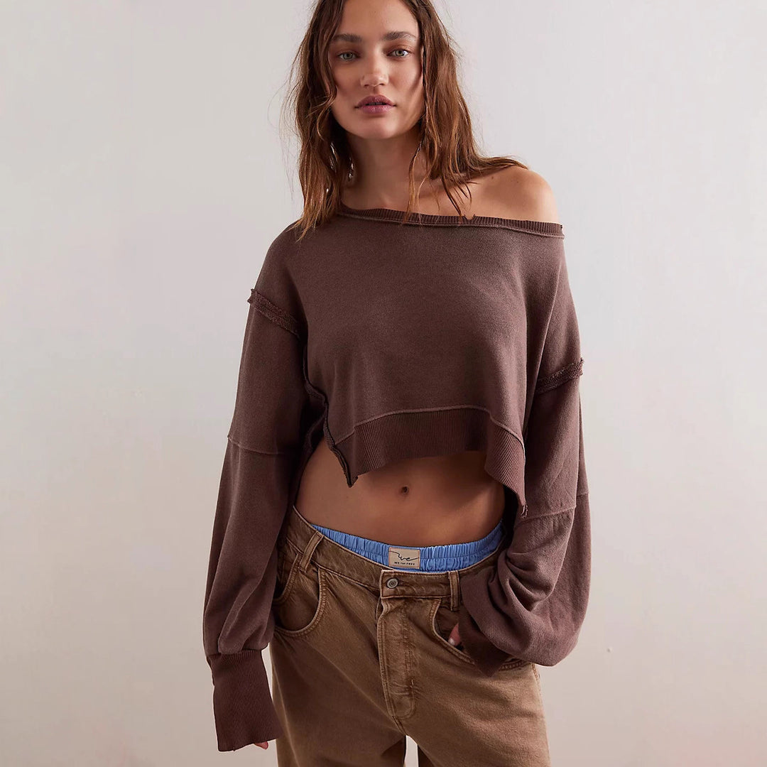 Damen cropped Oversize-Sweatshirt mit Daumenloch, fransigem Saum und weitem Raglanärmel – Avérine