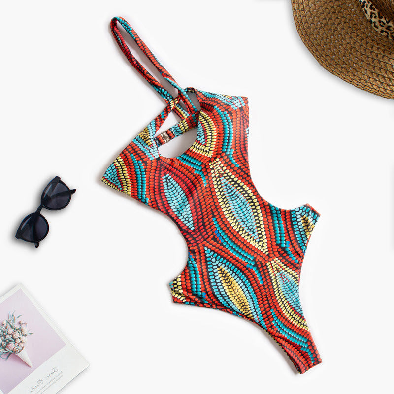 Damen Einteiliger Badeanzug mit asymmetrischem Cut-Out und floralem Design Echo Archiv