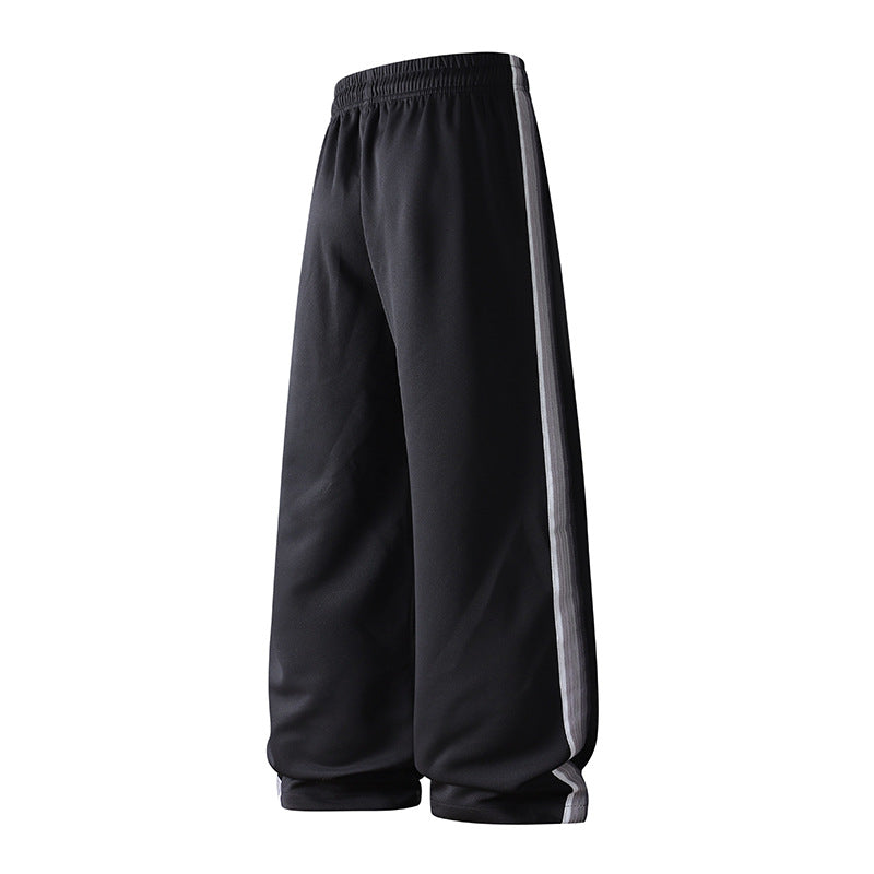 Herren weite Baggy-Trainingshose mit Tunnelzugbund, elastischem Komfortbund und seitlichem Streifendetail Echo Archiv