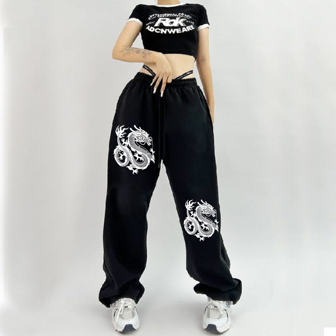 Damen weite Jogginghose hochgeschnitten mit seitlichem Statementprint und elastischem Bund – Avélisse