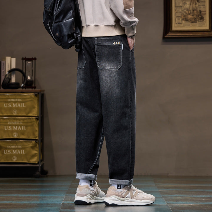 Herren Weite gerade geschnittene Denim-Jeans mit Used‑Wash und Umschlagbund Echoarchiv