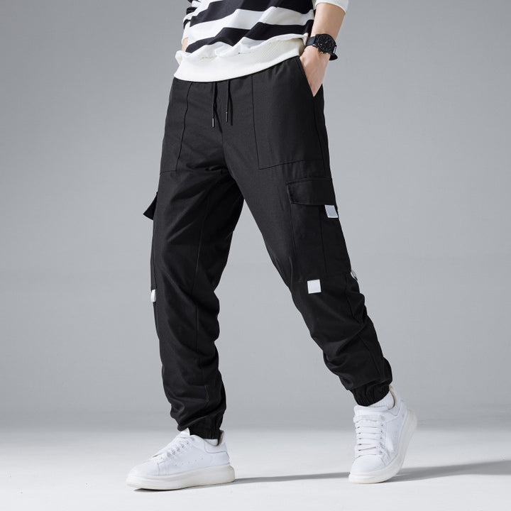 Herren Multifunktionale Cargo-Jogginghose mit Klapp‑ und Gurt-Details Echo Archiv