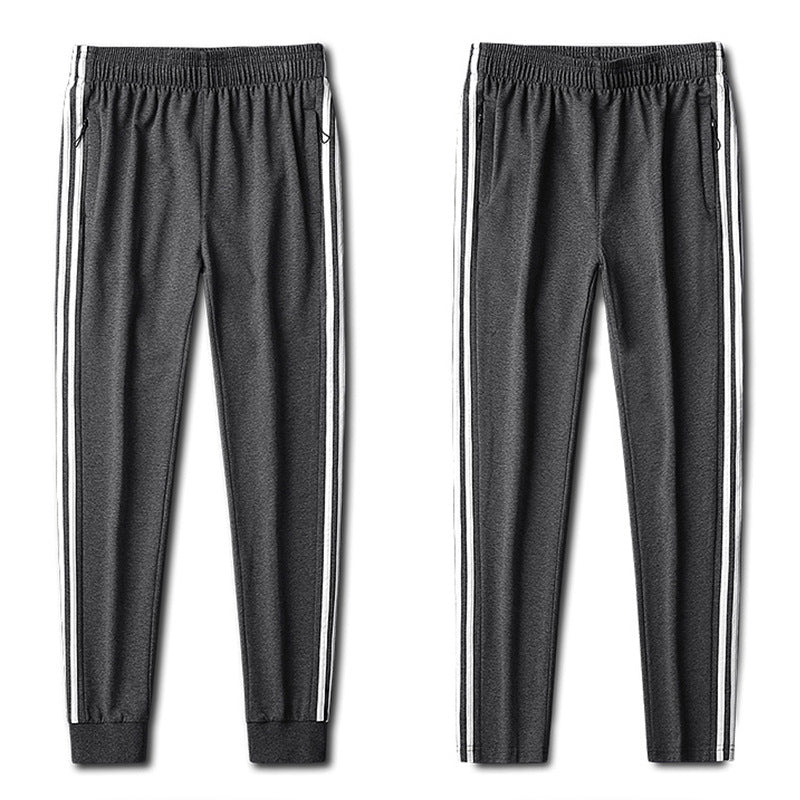 Herren Slim-Fit Trackhose mit seitlichen Kontraststreifen, Reißverschlusstaschen und elastischem Bund – Sorevano